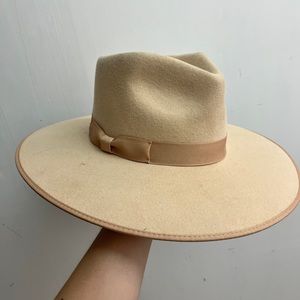 Lack of colour cream hat